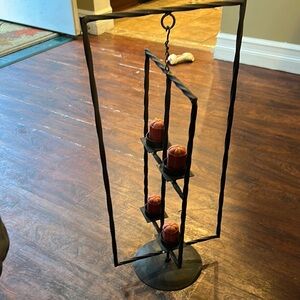 Black Metal Candle Holder with Red Candles